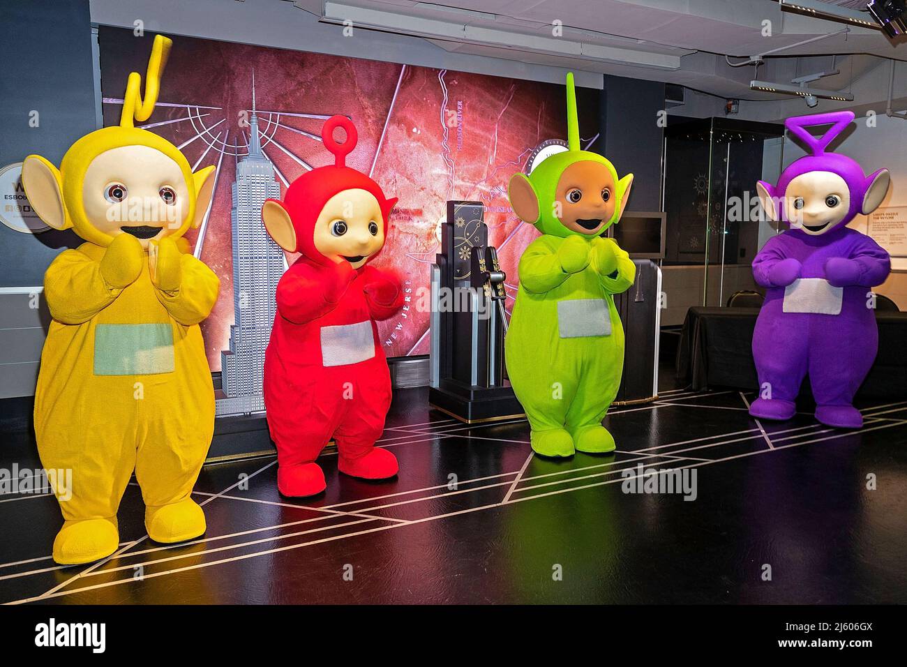 New York, NY, USA. 26th Apr, 2022. Laa-Laa, Po, Dipsy, Tinky Winky at the Teletubbies ceremonial lighting of the Empire State Building in their iconic colors of purple, green, yellow and red in celebration of their 25th Anniversary year at The Empire State Building. Credit: Steve Mack/Alamy Live News Stock Photo