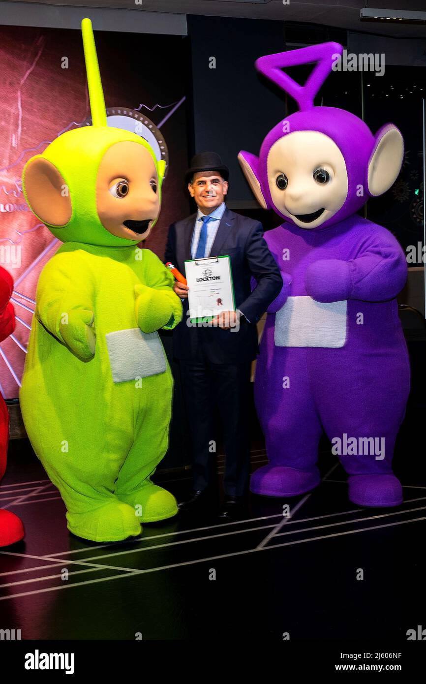 New York, NY, USA. 26th Apr, 2022. Dipsy, Bo Govea, with Lloyds of London, Tinky Winky at the Teletubbies ceremonial lighting of the Empire State Building in their iconic colors of purple, green, yellow and red in celebration of their 25th Anniversary year at The Empire State Building. Credit: Steve Mack/Alamy Live News Stock Photo