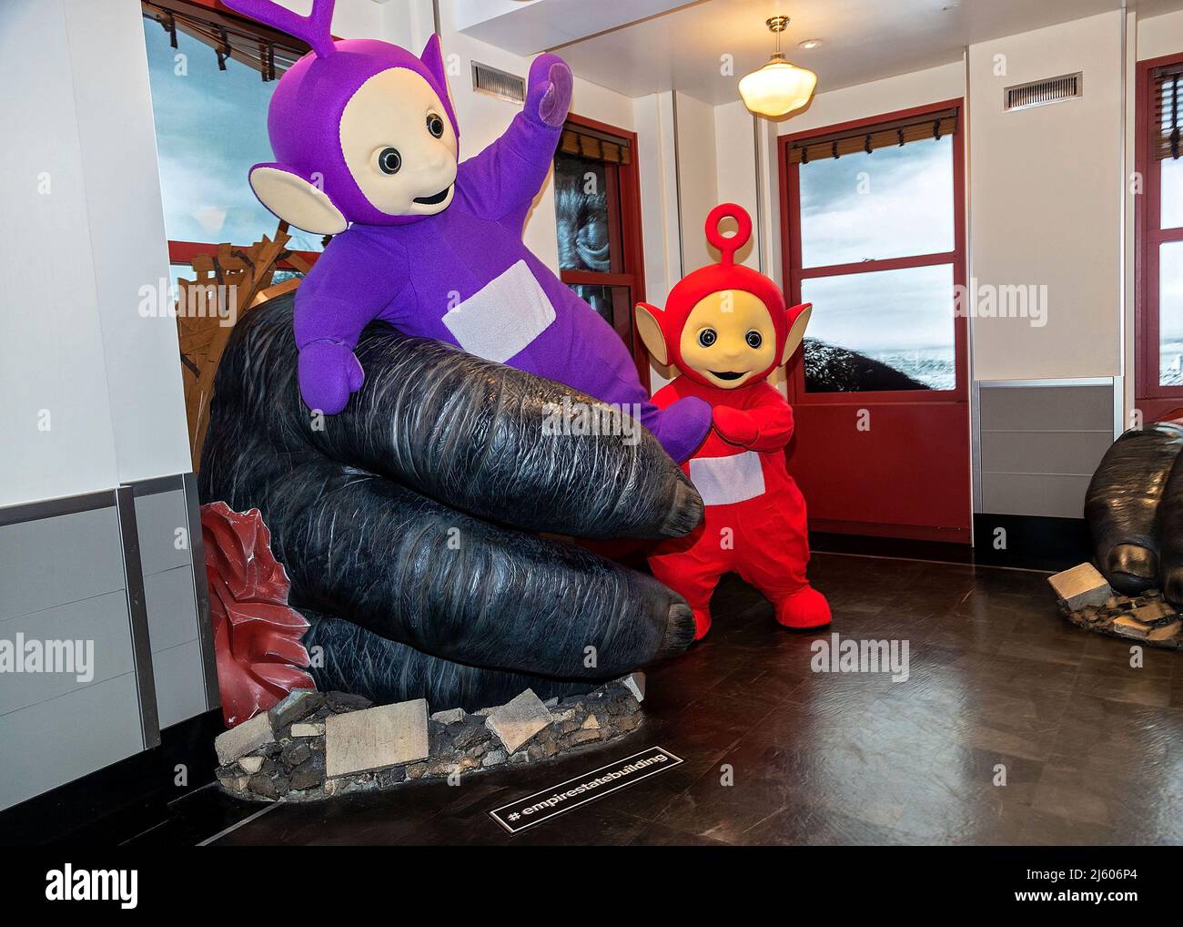 New York, NY, USA. 26th Apr, 2022. Tinky Winky, Po at the Teletubbies ceremonial lighting of the Empire State Building in their iconic colors of purple, green, yellow and red in celebration of their 25th Anniversary year at The Empire State Building. Credit: Steve Mack/Alamy Live News Stock Photo