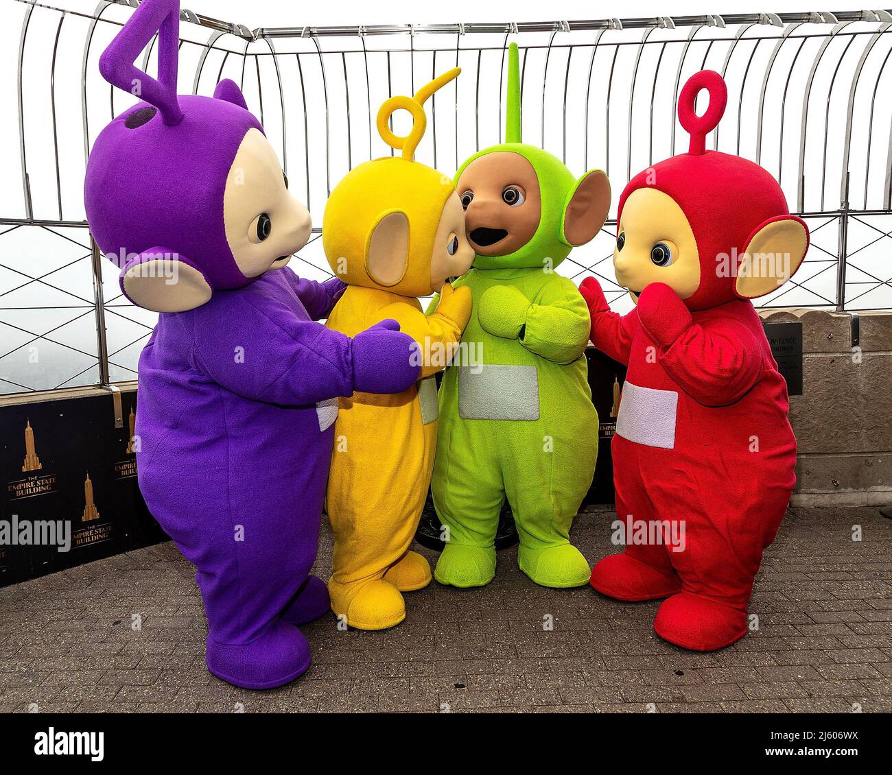 New York, NY, USA. 26th Apr, 2022. Tinky Winky, Laa-Laa, Dipsy, Po at the Teletubbies ceremonial lighting of the Empire State Building in their iconic colors of purple, green, yellow and red in celebration of their 25th Anniversary year at The Empire State Building. Credit: Steve Mack/Alamy Live News Stock Photo