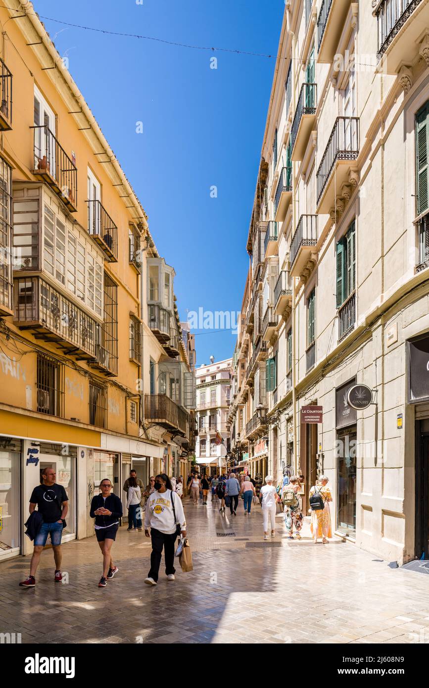 Streets of Malaga. Vertical photography of old town Malaga Small streets ,  promenade area with shops and restaurants. Beautiful building architectures  Stock Photo - Alamy, image size:867x1390