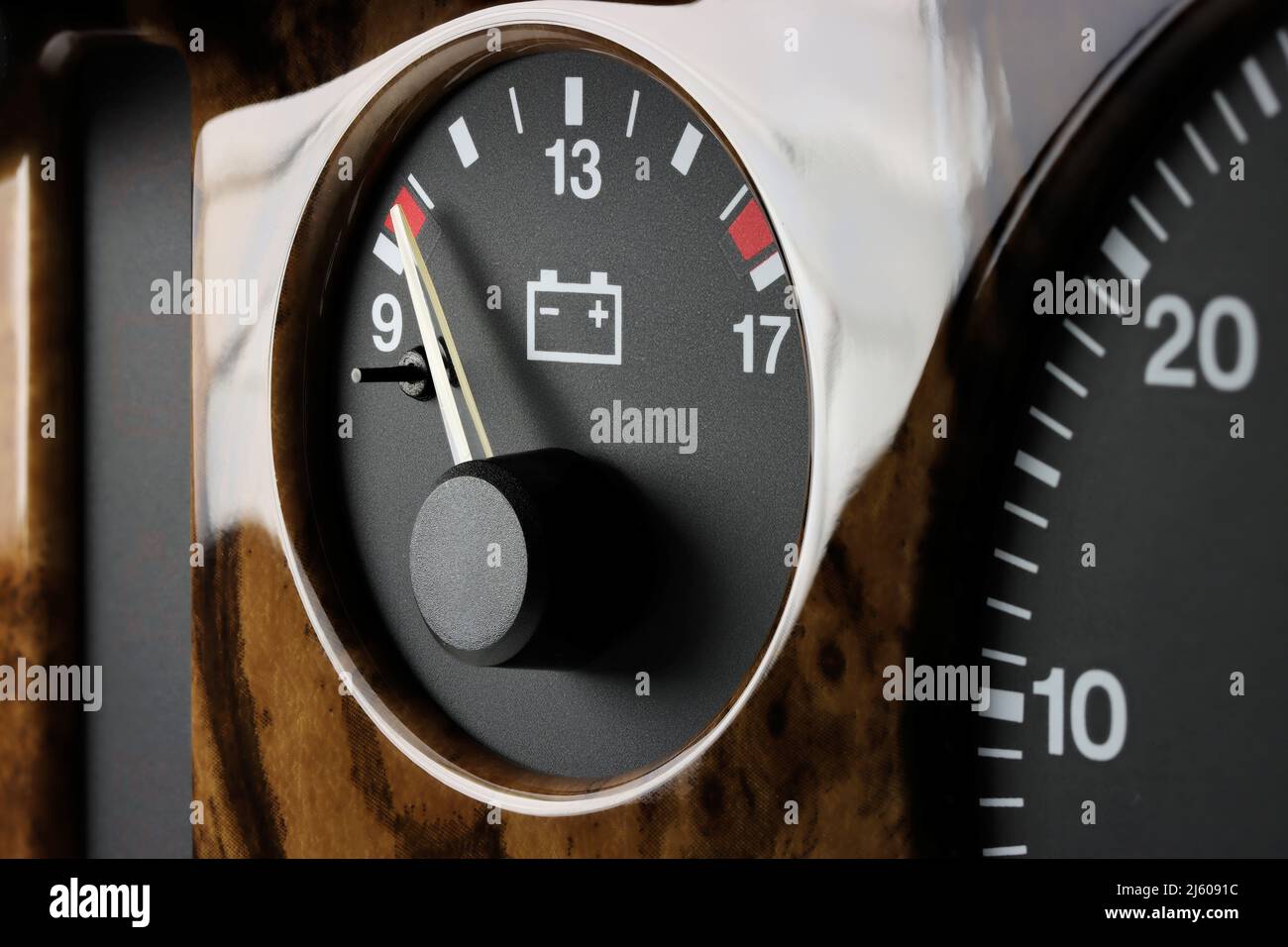 batterie gauge in car dashboard - low volts Stock Photo
