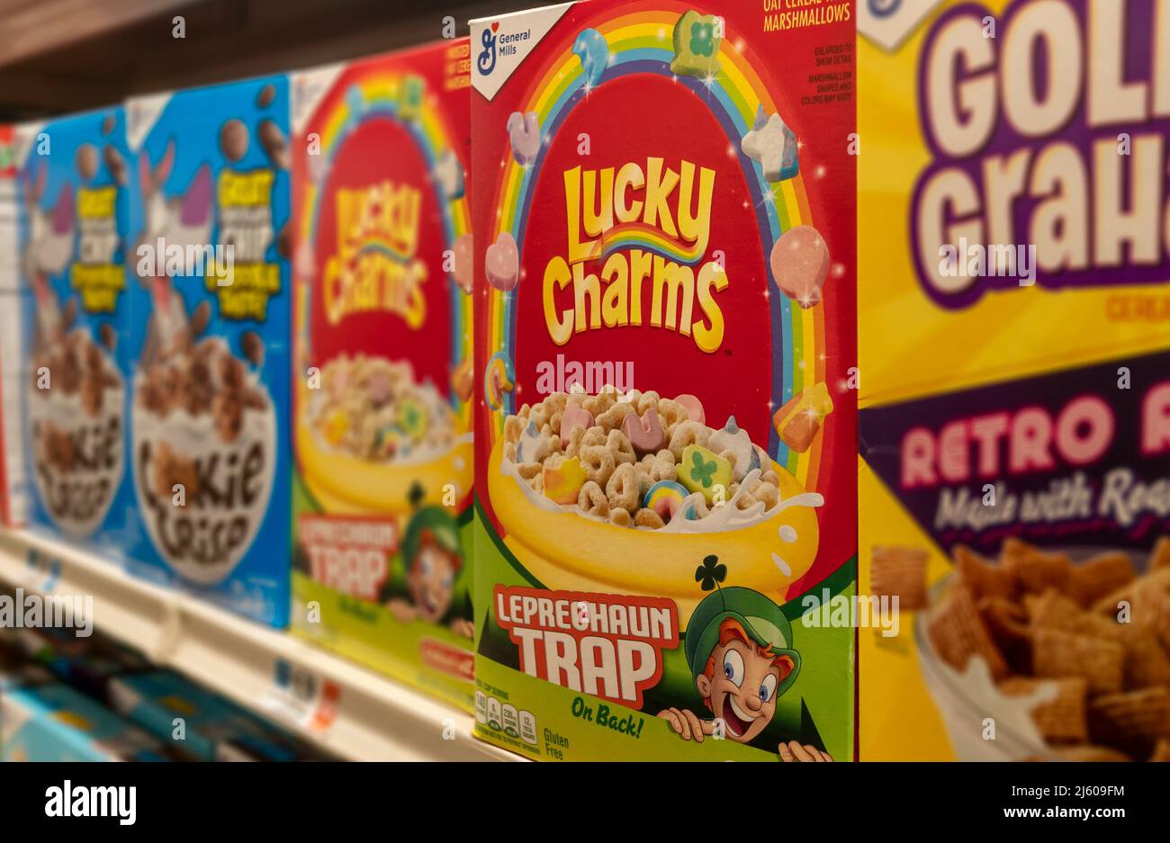Boxes of General Mills breakfast cereals including Lucky Charms displayed on supermarket shelves in New York on Monday, April 18, 2022. The US Food and Drug Administration announced it was investigating after receiving thousands of reports that people had become ill after eating the cereal.(© Richard B. Levine) Stock Photo