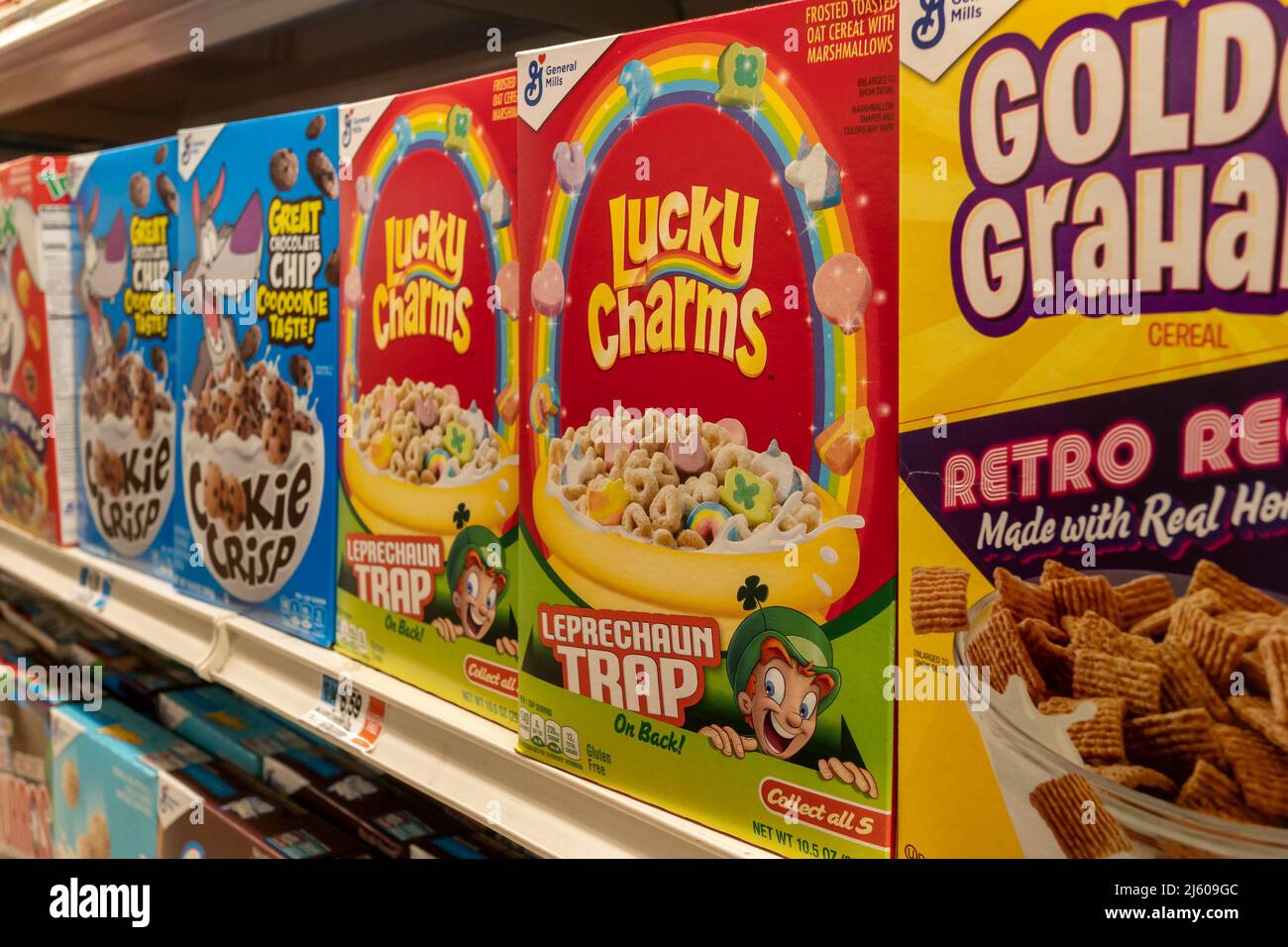 Boxes of General Mills breakfast cereals including Lucky Charms displayed on supermarket shelves in New York on Monday, April 18, 2022. The US Food and Drug Administration announced it was investigating after receiving thousands of reports that people had become ill after eating the cereal.(© Richard B. Levine) Stock Photo