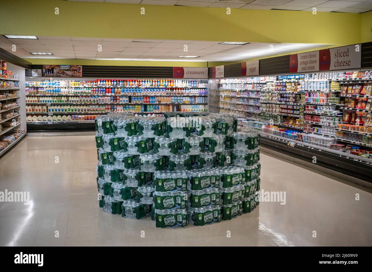 Dairy department of a supermarket in New York , with a display of Poland Spring bottled water, on Monday, April 18, 2022. Inflation has climbed 8.5% in March compared to the same time last year. This has been the largest increase since 1981. (© Richard B. Levine) Stock Photo