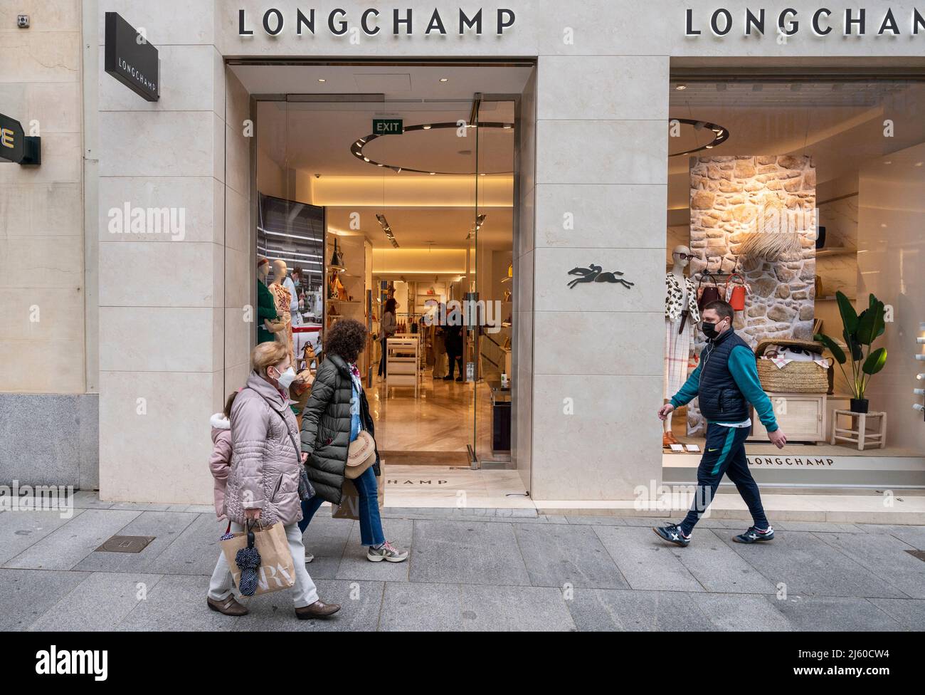 Madrid, Spain. 26th Apr, 2022. Pedestrians walk past the French luxury  fashion brand Longchamp store in Spain. (Photo by Xavi Lopez/SOPA  Images/Sipa USA) Credit: Sipa USA/Alamy Live News Stock Photo - Alamy