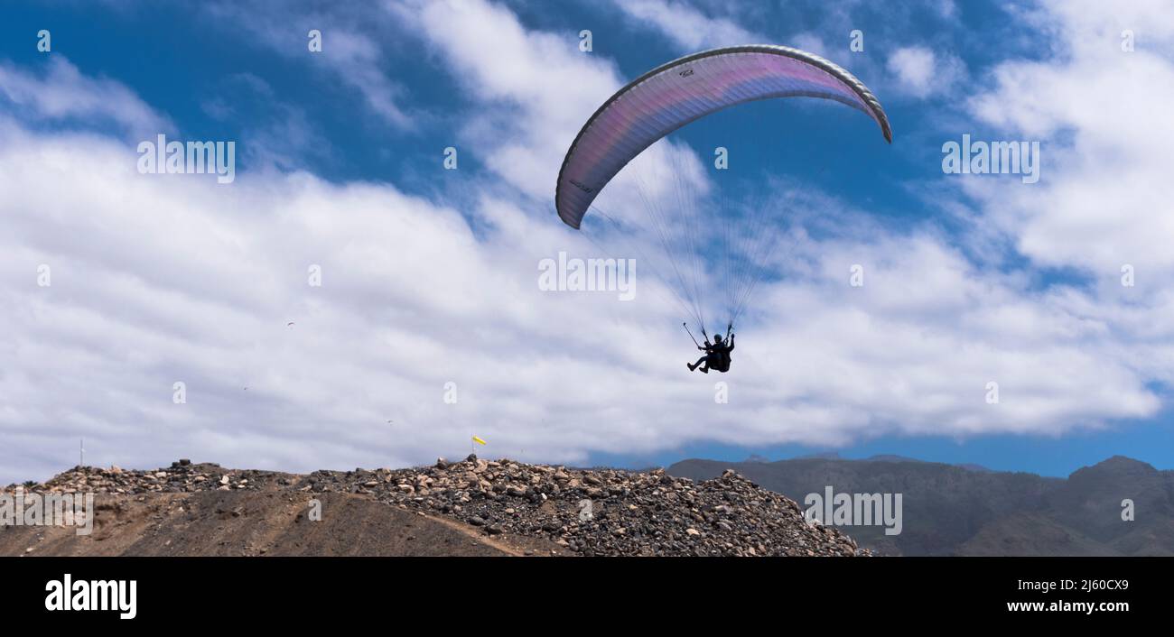 dh La Caleta COSTA ADEJE TENERIFE Paragliding sport south coast tandem paraglider Stock Photo