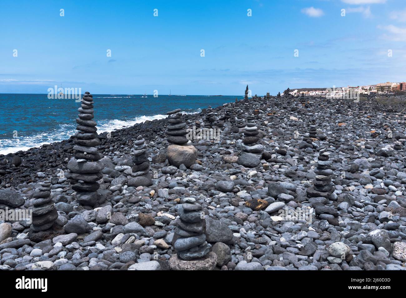 dh Beach art COSTA ADEJE TENERIFE Rock stone stack beaches stones rocky shore coast Stock Photo