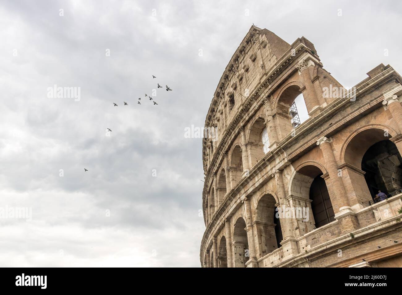 Roman Colosseum at Day under cloudy skies in City of Rome, Italy 03 Stock Photo