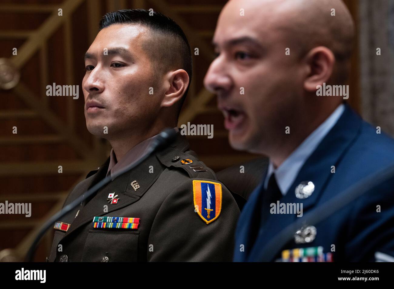 UNITED STATES APRIL 26 Army Capt. Samuel Choe, left, a former
