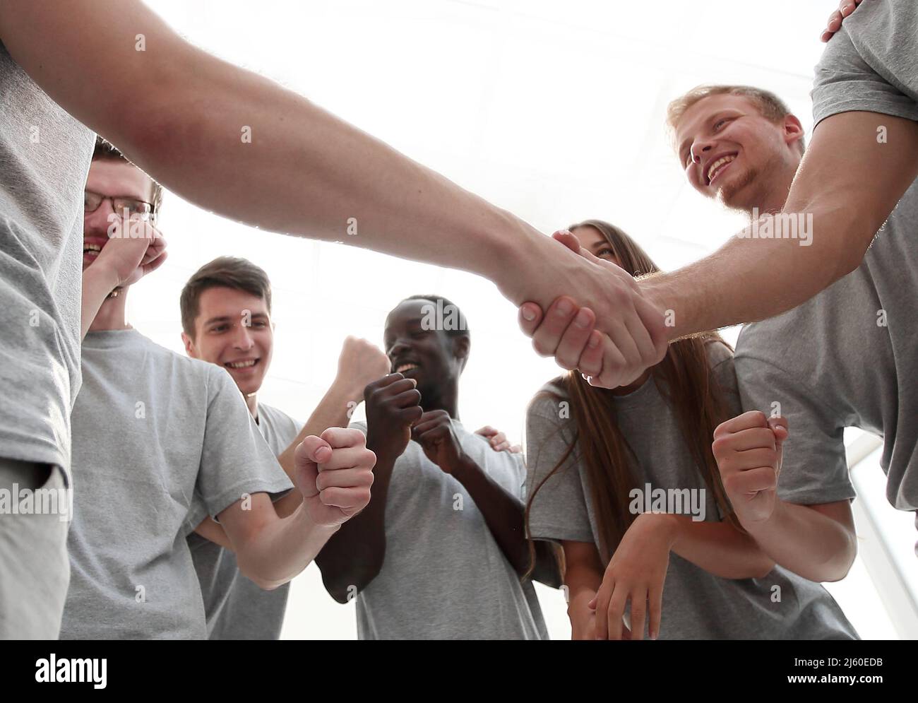 handshake of young people in a circle of friends Stock Photo - Alamy