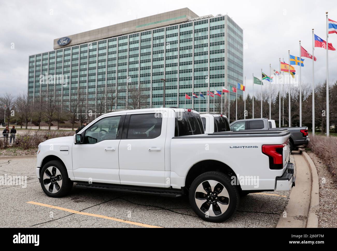 A model of the all-new Ford F-150 Lightning electric pickup is parked in front of the Ford Motor Company World Headquarters in Dearborn, Michigan, U.S. April 26, 2022. REUTERS/Rebecca Cook Stock Photo