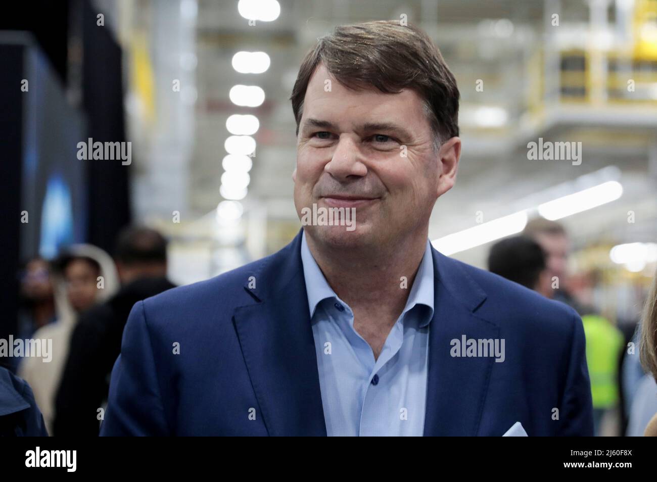 Ford CEO Jim Farley attends the official launch of the all-new Ford F-150 Lightning electric pickup truck at the Ford Rouge Electric Vehicle Center in Dearborn, Michigan, U.S. April 26, 2022. REUTERS/Rebecca Cook Stock Photo