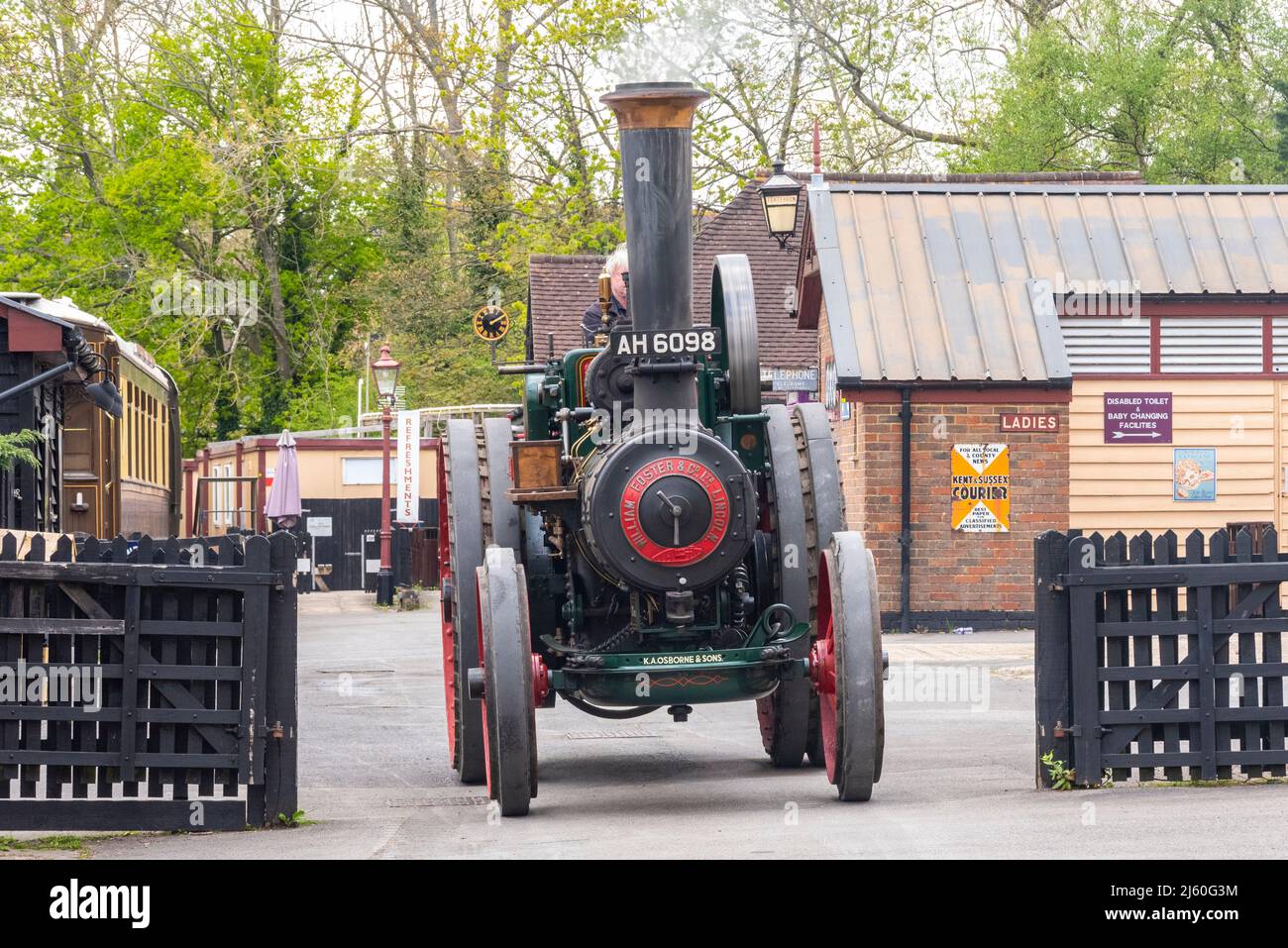 Steam traction engine driving out from Tenterden Town station on the Kent & East Sussex Railway. William Foster, Foster General Purpose Engine Stock Photo