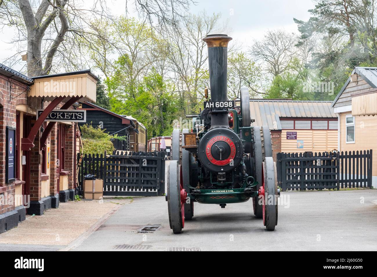 Steam traction engine driving out from Tenterden Town station on the Kent & East Sussex Railway. William Foster, Foster General Purpose Engine Stock Photo