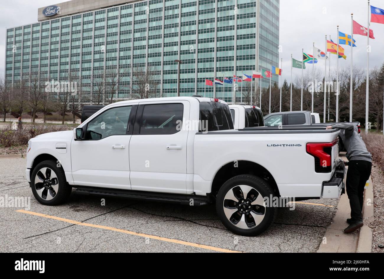 A model of the all-new Ford F-150 Lightning electric pickup is parked in front of the Ford Motor Company World Headquarters in Dearborn, Michigan, U.S., April 26, 2022. REUTERS/Rebecca Cook Stock Photo