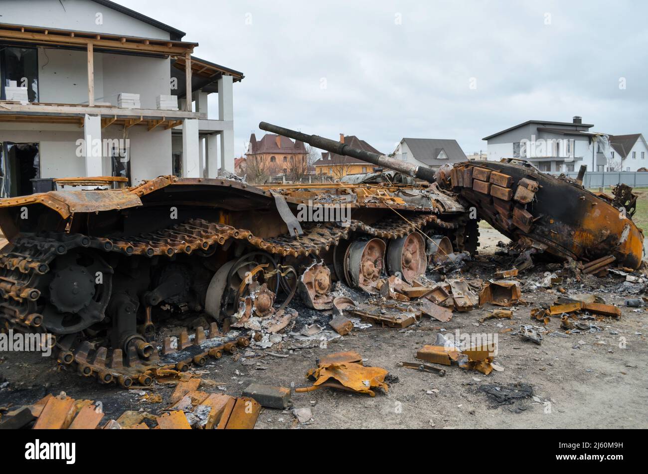 Dmytrivka village, Kyiv region, Ukraine - April 13, 2022: Destroyed Russian tank following the Ukrainian forces counter-attacks. Stock Photo