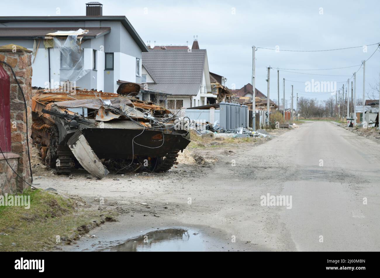 Dmytrivka, Kyiv region, Ukraine - Apr 13, 2022: Destroyed infantry fighting vehicle of the Russian army following the Ukrainian forces counter-attacks Stock Photo
