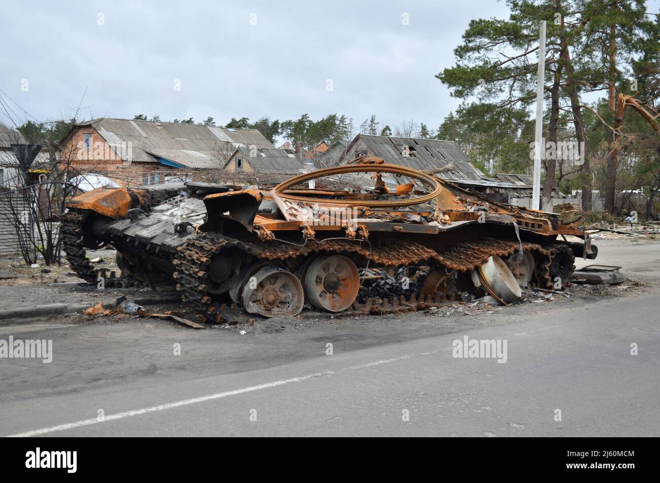 Dmytrivka village, Kyiv region, Ukraine - April 13, 2022: Destroyed Russian tank following the Ukrainian forces counter-attacks. Stock Photo