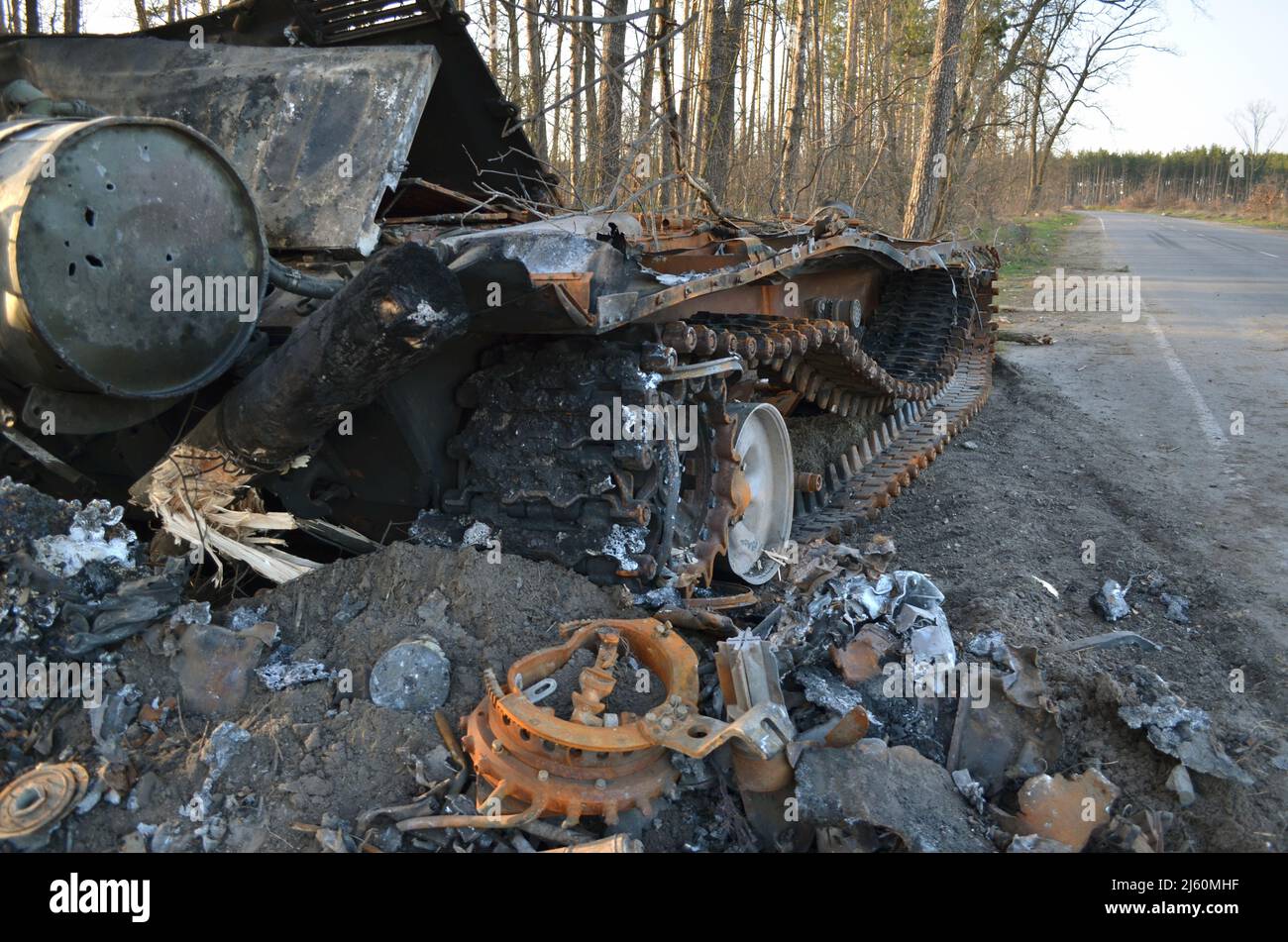 Dmytrivka, Kyiv region, Ukraine - April 14, 2022: Destroyed Russian tank following the Ukrainian forces counter-attacks. War of Russia against Ukraine Stock Photo