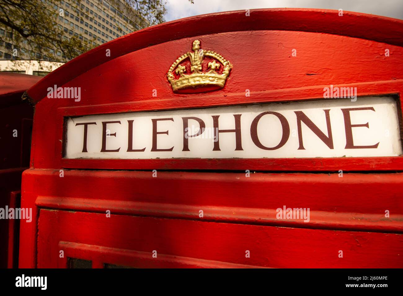 Close up of a British red telephone box telephone sign Stock Photo