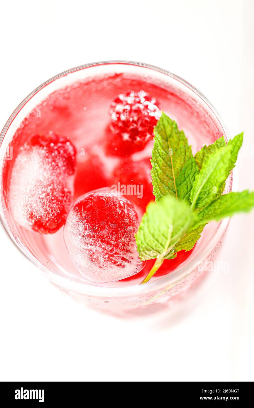 Raspberry cocktail.Summer drink.raspberry pink drink.Ice cubes with ...