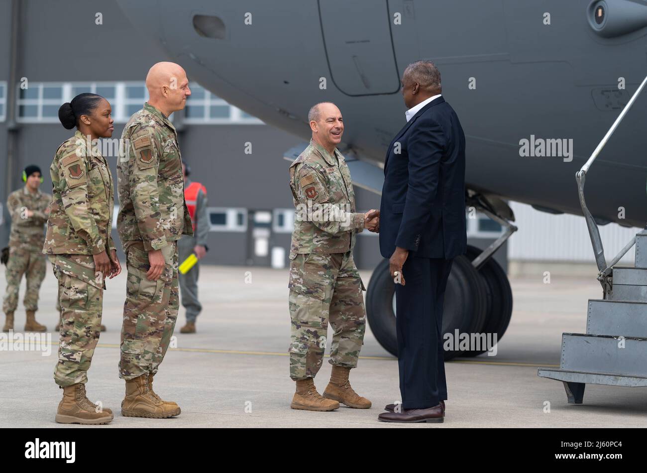 U.S. Secretary of Defense Lloyd Austin III (right) is greeted by (right to left) U.S. Air Force Gen. Jeffrey L. Harrigian, U.S. Air Forces in Europe – Air Forces Africa commander, Brig. Gen. Joshua Olson, 86th Airlift Wing commander and 86 AW Command Chief Master Sgt. Charmaine Kelley, at Ramstein Air Base, Germany, April 25, 2022. Secretary Austin invited Ministers of Defense and senior military officials to Ramstein this week to discuss the ongoing crisis in Ukraine and various issues facing U.S. allies and partners. (U.S. Air Force photo by Airman 1st Class Edgar Grimaldo) Stock Photo