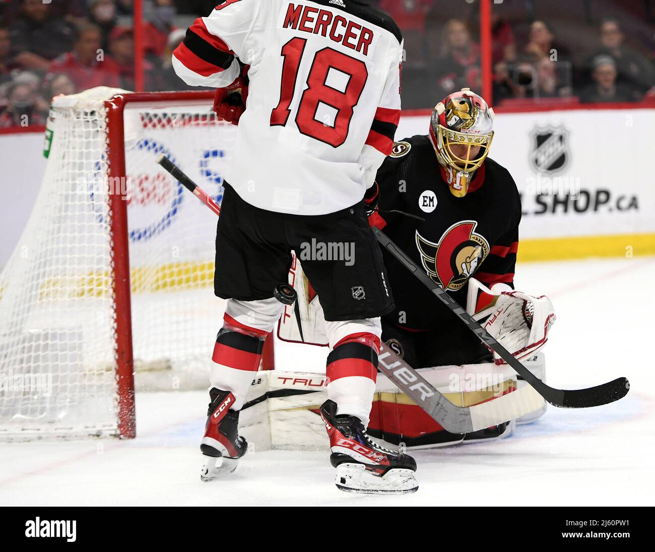 April 26, 2022, Ottawa, ON, CANADA: Ottawa Senators Anton Forsberg (31) watches the puck bounce behind New Jersey Devils centre Dawson Mercer (18) during first NHL hockey action in Ottawa,