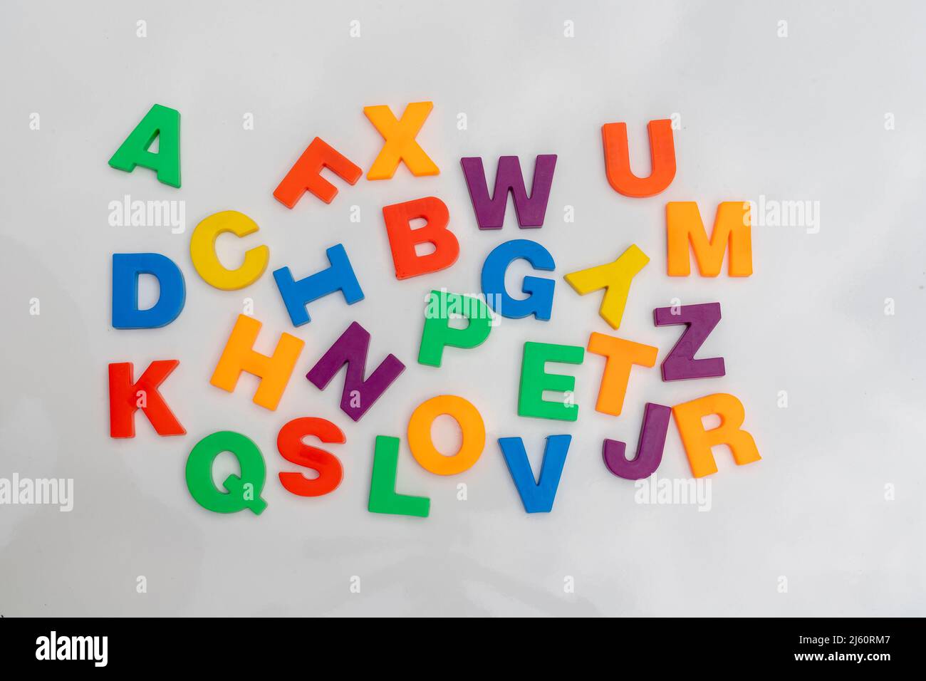 Alphabet letters in a random order on a white background Stock Photo