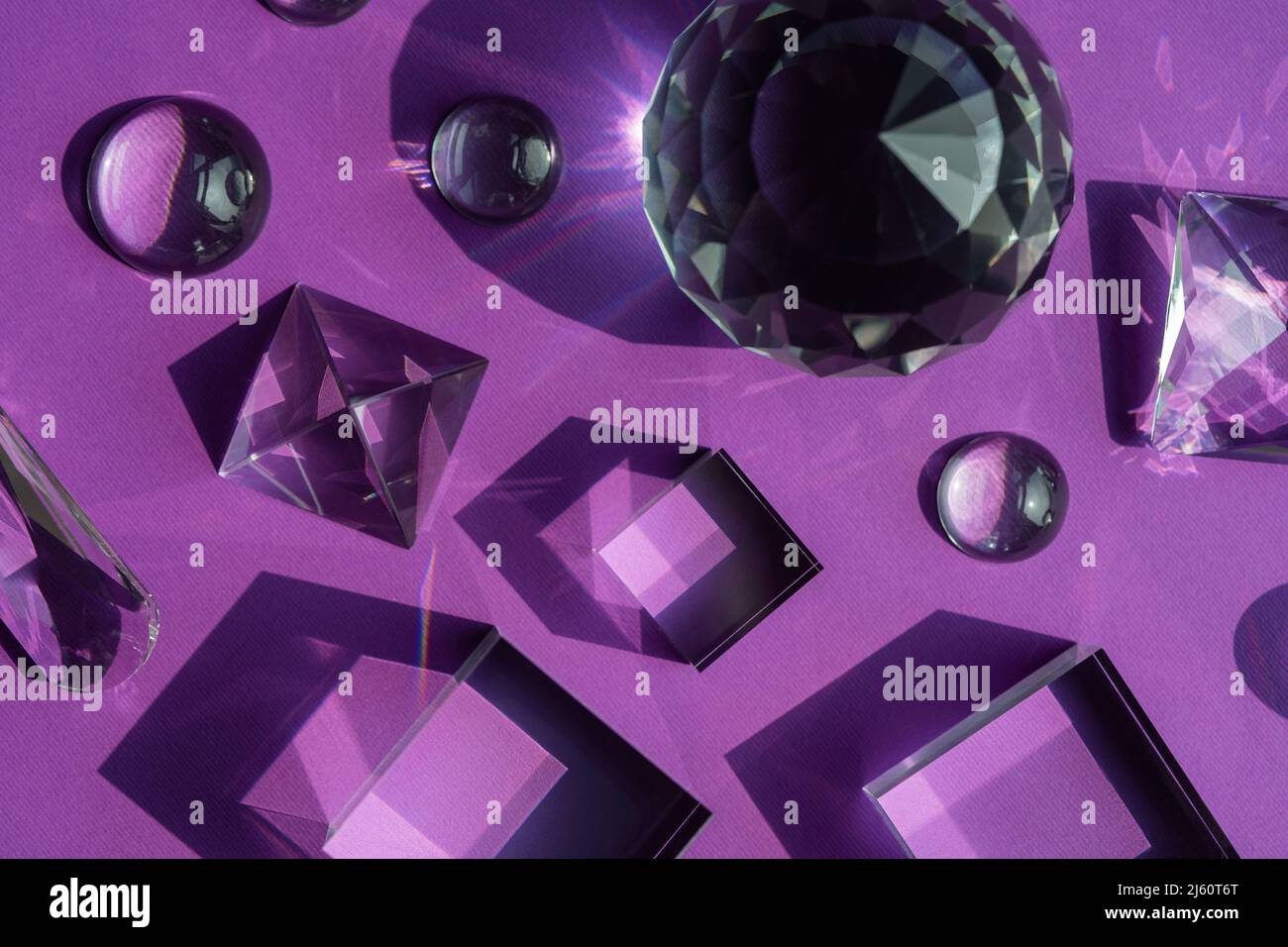 Crystal prism refracting light, magic crystals and pyramid, sphere and