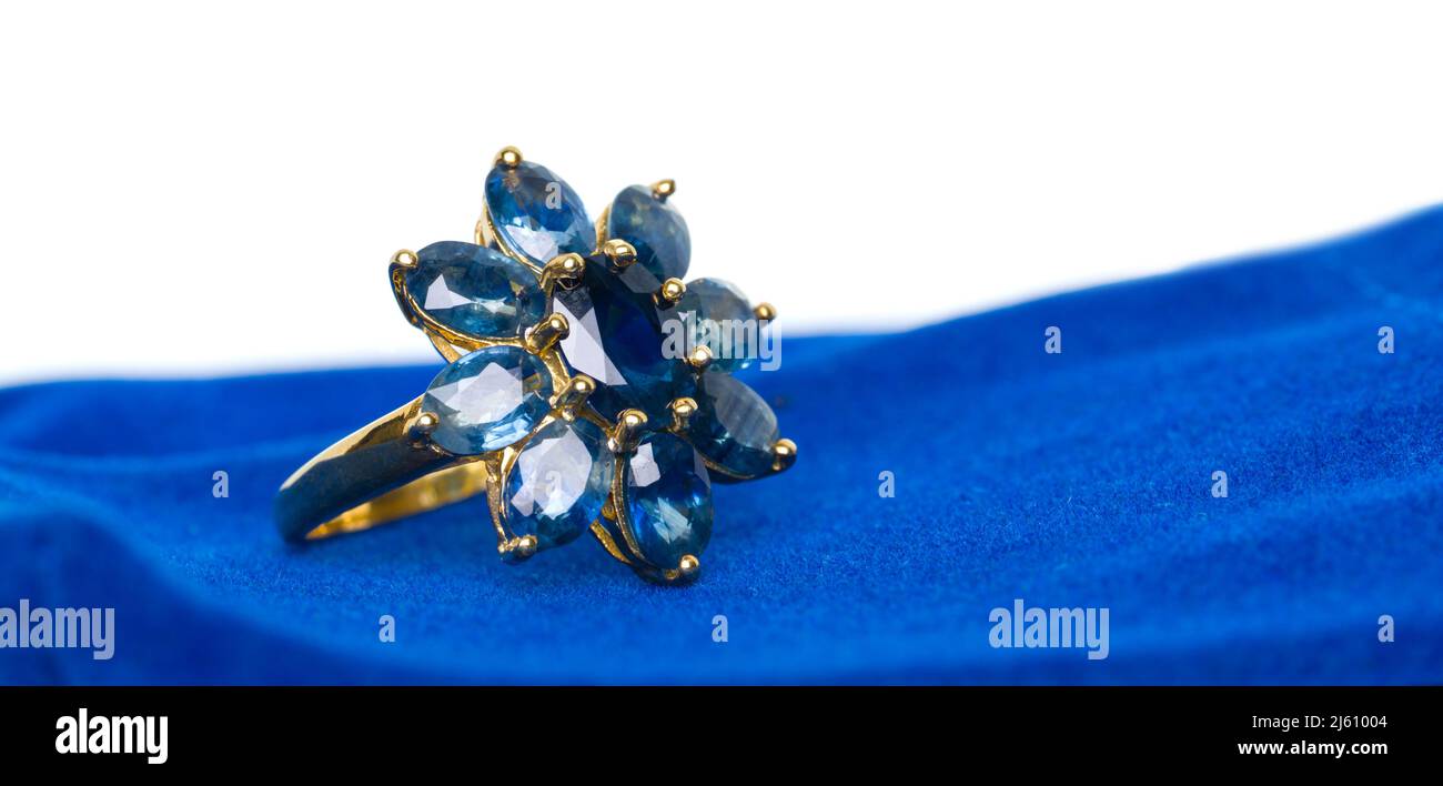 Blue Sapphire Jewel or gems ring on velvet bag. Collection of natural gemstones accessories. Studio shot Stock Photo