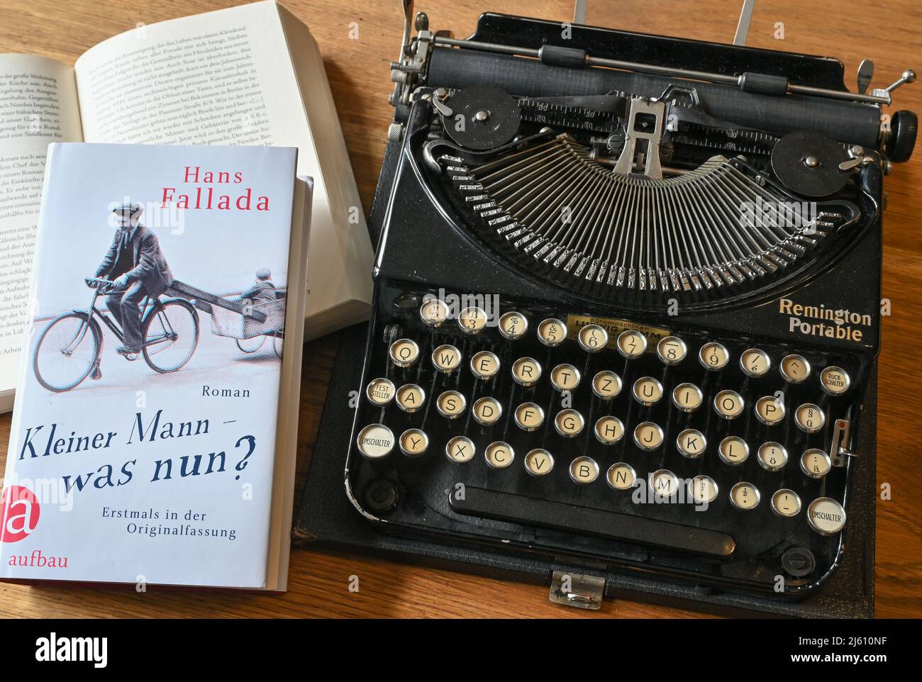 Neuenhagen Bei Berlin, Germany. 08th Apr, 2022. In the museum about the writer Hans Fallada (civil name: Rudolf Wilhelm Friedrich Ditzen) books and a typewriter are exhibited. 2022 marks the 75th anniversary of the writer's death. (To dpa: ''Everything in my life ends in a book'') Credit: Patrick Pleul/dpa/Alamy Live News Stock Photo