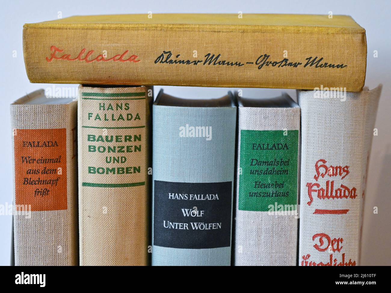 Neuenhagen Bei Berlin, Germany. 08th Apr, 2022. Various books by writer Hans Fallada (civil name: Rudolf Wilhelm Friedrich Ditzen) are on display in a small museum set up in his former home. 2022 marks the 75th anniversary of the writer's death. (To dpa: ''Everything in my life ends in a book'') Credit: Patrick Pleul/dpa/Alamy Live News Stock Photo