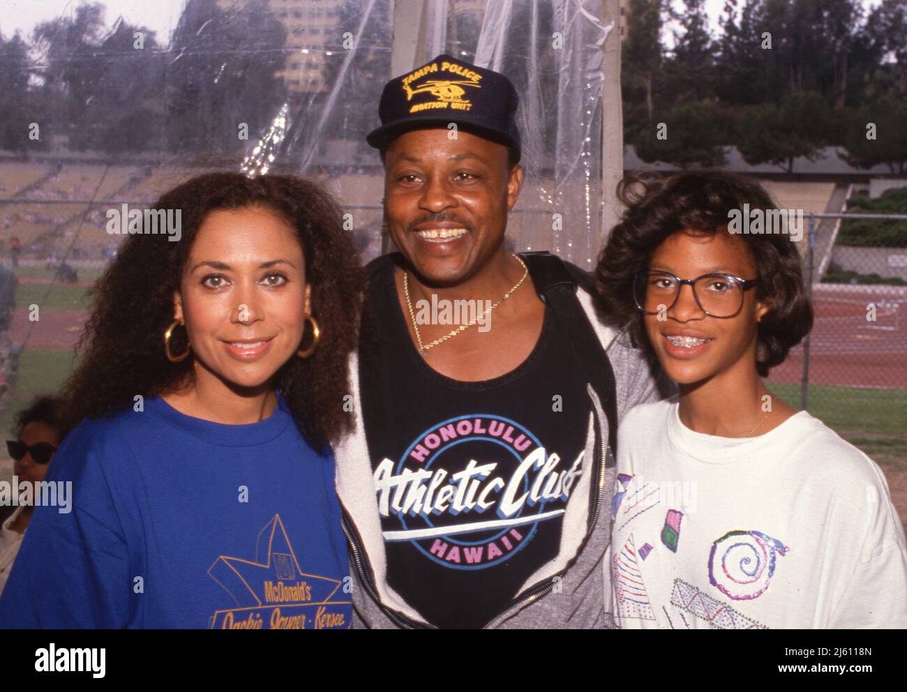 Denise Nicholas with Roger E. Mosley and his daughter Ch'a at the Jackie Joyner Kersee Invitational June 18, 1989. Credit: Ralph Dominguez/MediaPunch Stock Photo