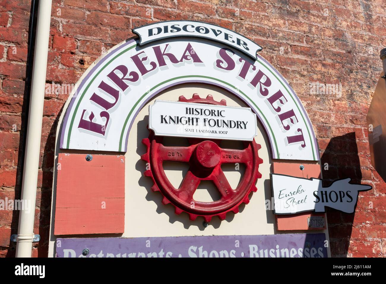 Eureka street sign advertises shop, restaurants and historic Knight Foundry museum. - Sutter Creek, California, USA - 2022 Stock Photo