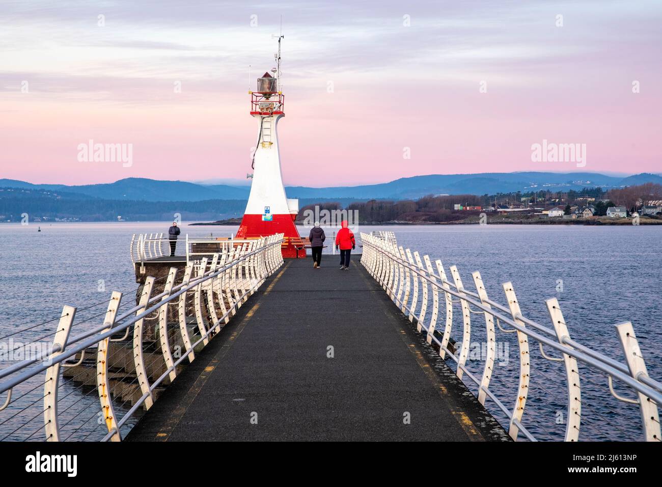 Ogden Point Breakwater Lighthouse at sunrise - Victoria, Vancouver Island, British Columbia, Canada Stock Photo