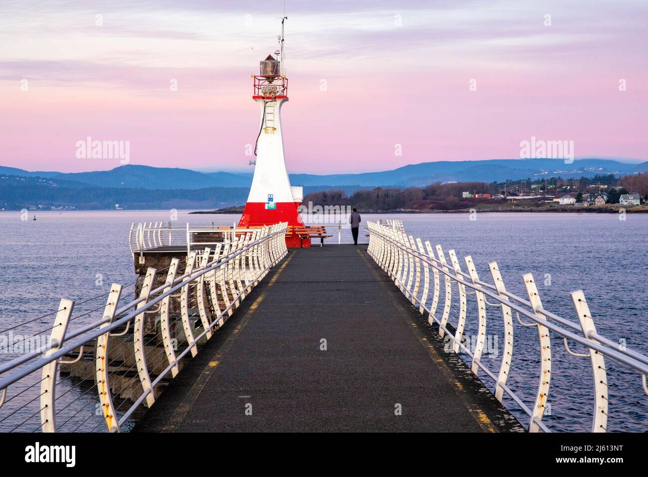 Ogden Point Breakwater Lighthouse at sunrise - Victoria, Vancouver Island, British Columbia, Canada Stock Photo