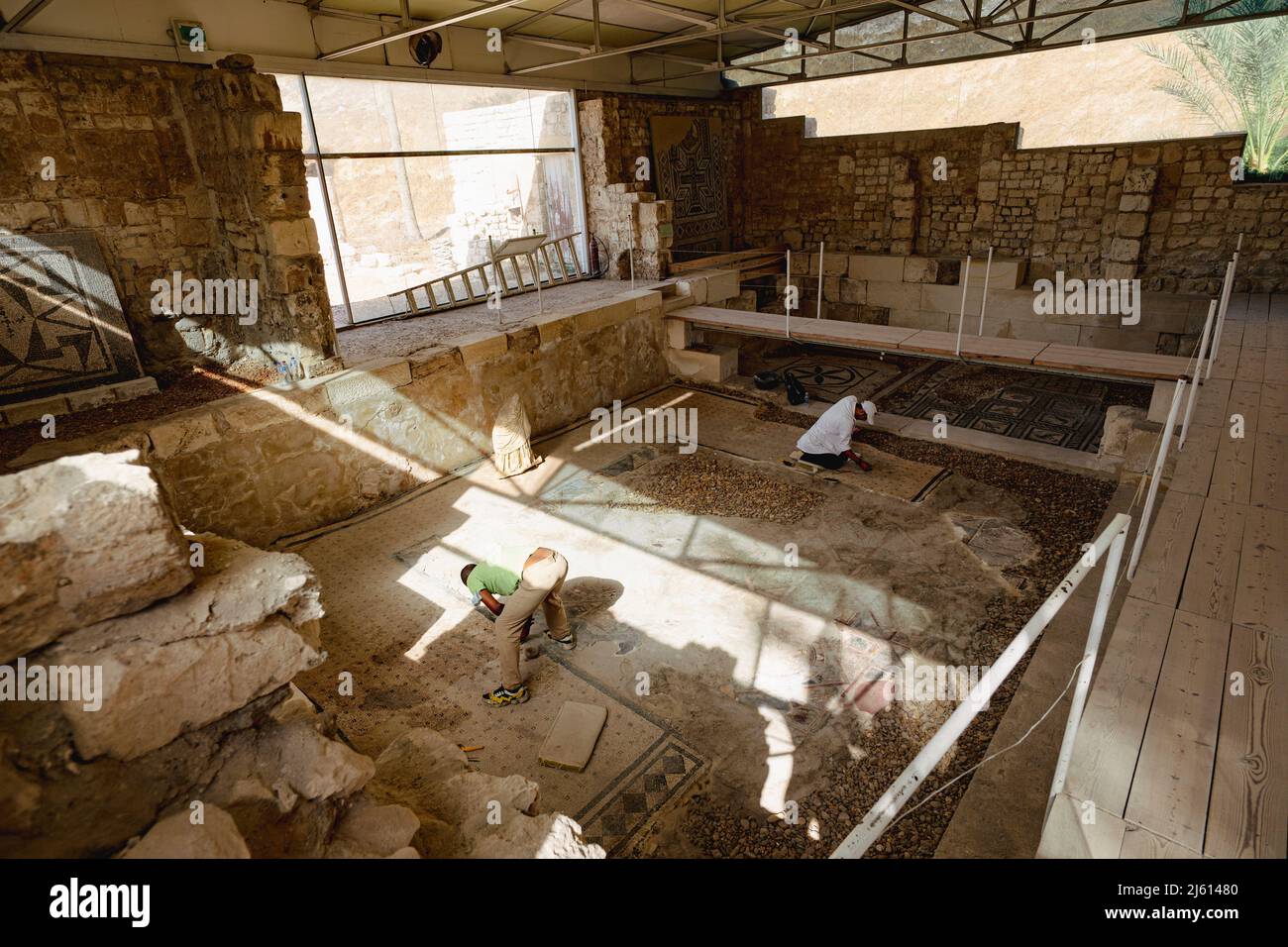 Male archaeologists restore an ancient Roman mosaic in Alexandria, Egypt. October 17, 2022. Alexandria. Egypt. Stock Photo
