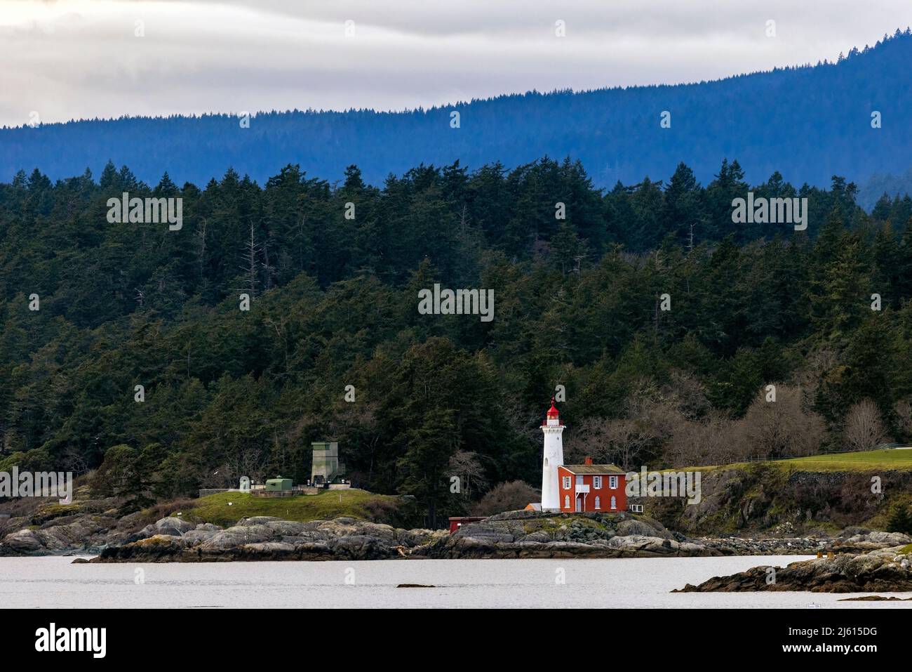 View of Fisgard Lighthouse from Saxe Point Park in Esquimalt - Victoria, Vancouver Island, British Columbia, Canada Stock Photo