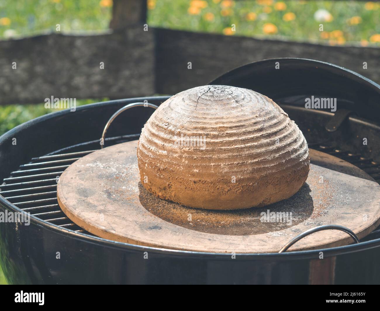 homemade bread on bbq grill or characoal with a crispy, chewy crust and