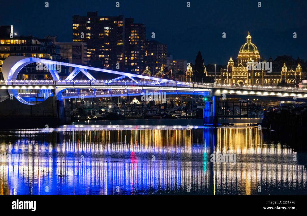Johnson Street Bridge and British Columbia Parliament Buildings at night - Victoria, Vancouver Island, British Columbia, Canada Stock Photo