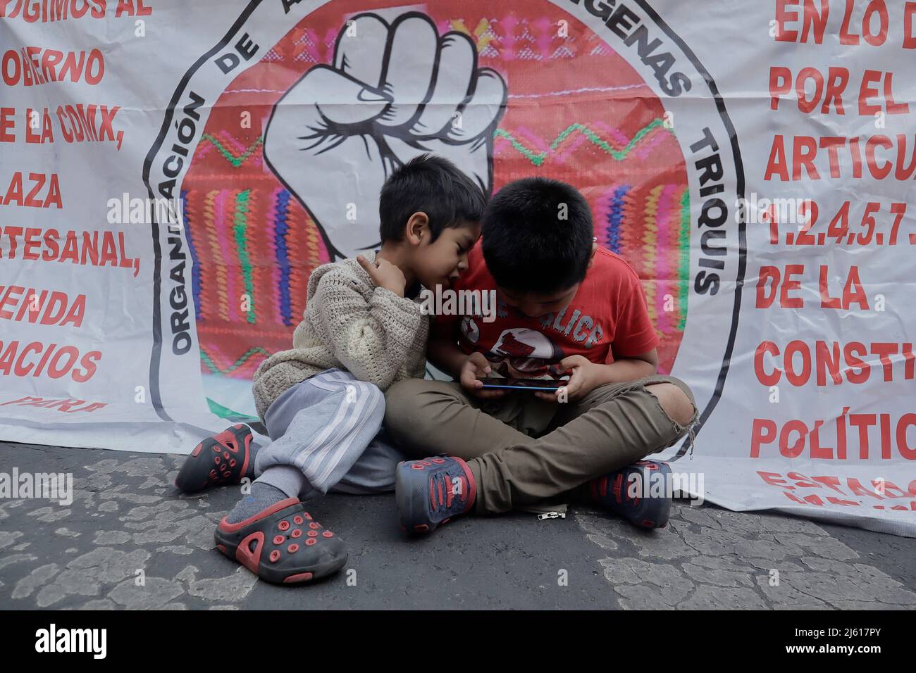 Mexico City, Mexico City, Mexico. 26th Apr, 2022. Members of the Triqui Indigenous community of Copala, Oaxaca, take part during a protest to demand a place to sell their handicrafts, after being evicted of the sit-in that they had maintained for several months. On April 26, 2022 in Mexico City, Mexico. (Credit Image: © Gerardo Vieyra/eyepix via ZUMA Press Wire) Stock Photo