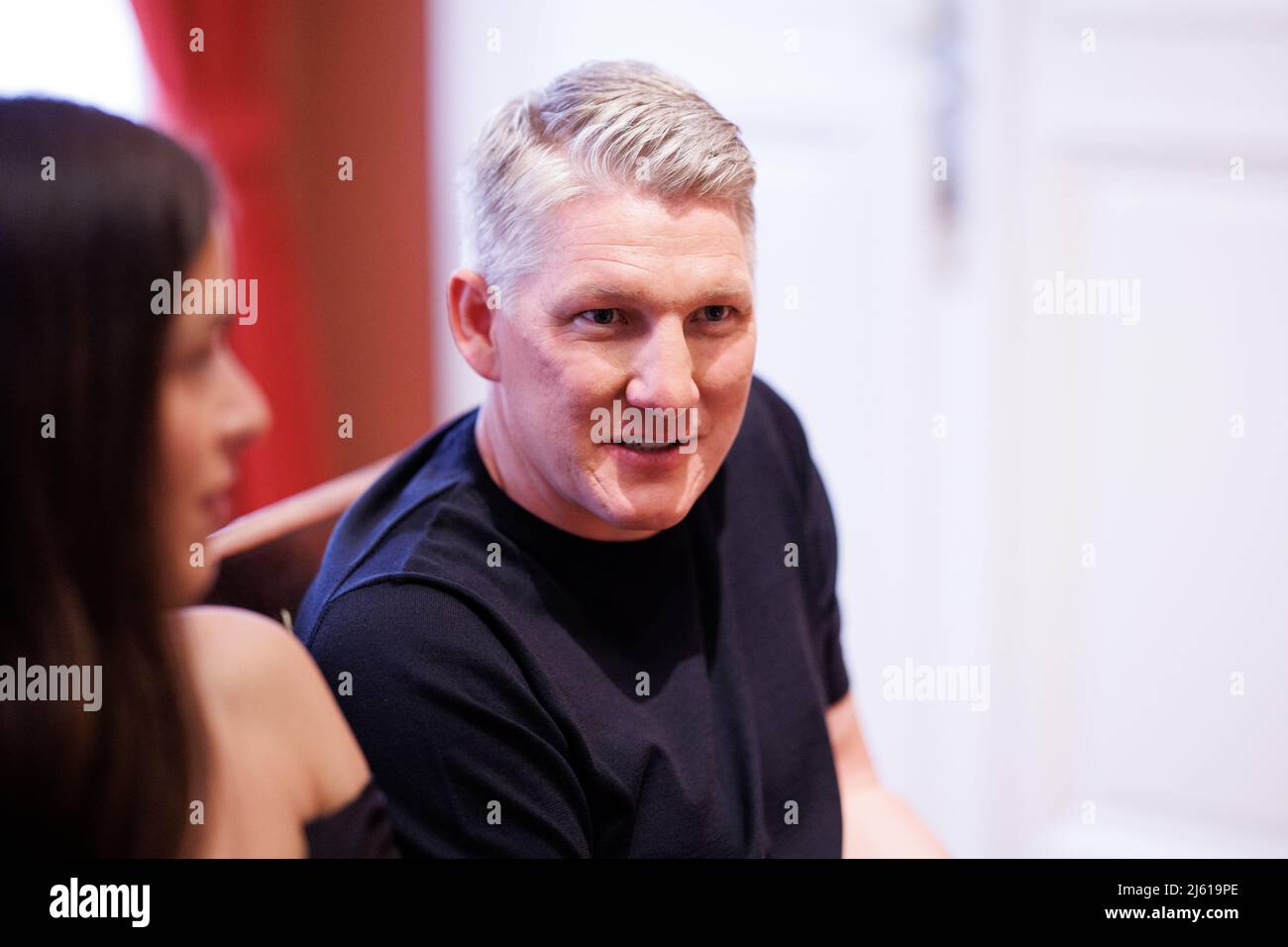 Munich, Germany. 26th Apr, 2022. EXCLUSIVE - Bastian Schweinsteiger, former German soccer player (r), and his wife Ana Ivanovic, Serbian former tennis player, give an interview on the sidelines of the Best Brands Awards 2022 ceremony at the Bayerischer Hof. Credit: Matthias Balk/dpa/Alamy Live News Stock Photo