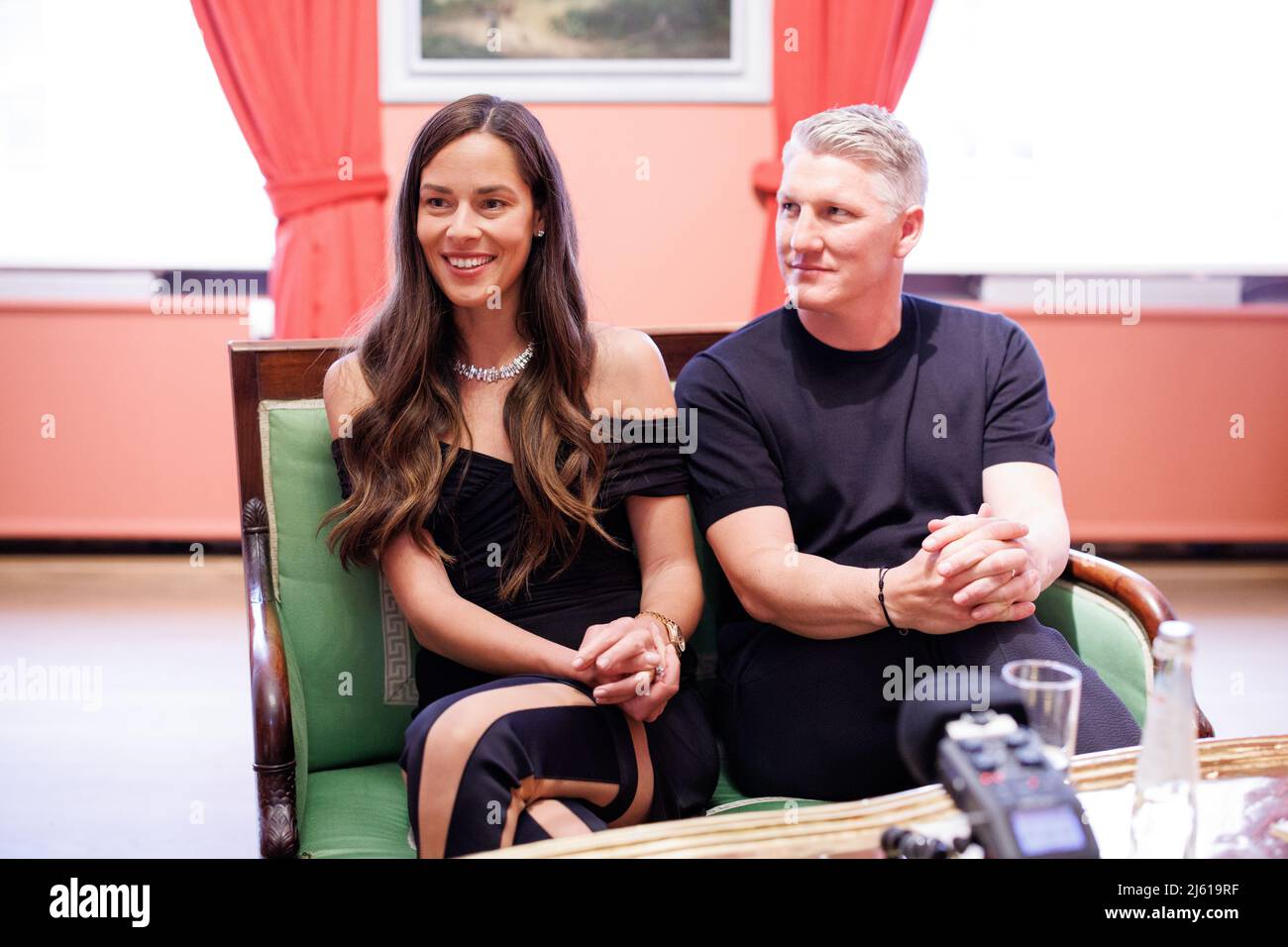 Munich, Germany. 26th Apr, 2022. EXCLUSIVE - Bastian Schweinsteiger, former German soccer player (r), and his wife Ana Ivanovic, Serbian former tennis player, give an interview on the sidelines of the Best Brands Awards 2022 ceremony at the Bayerischer Hof. Credit: Matthias Balk/dpa/Alamy Live News Stock Photo