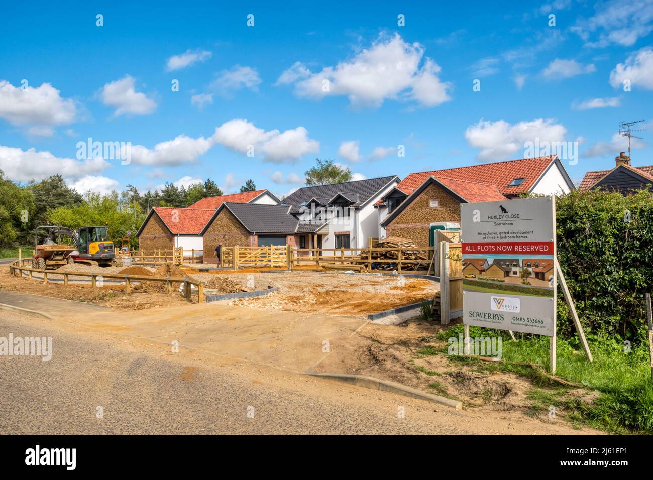 Construction of a gated development of large 4-bedroom houses at Huxley Close in Snettisham, Norfolk. Stock Photo