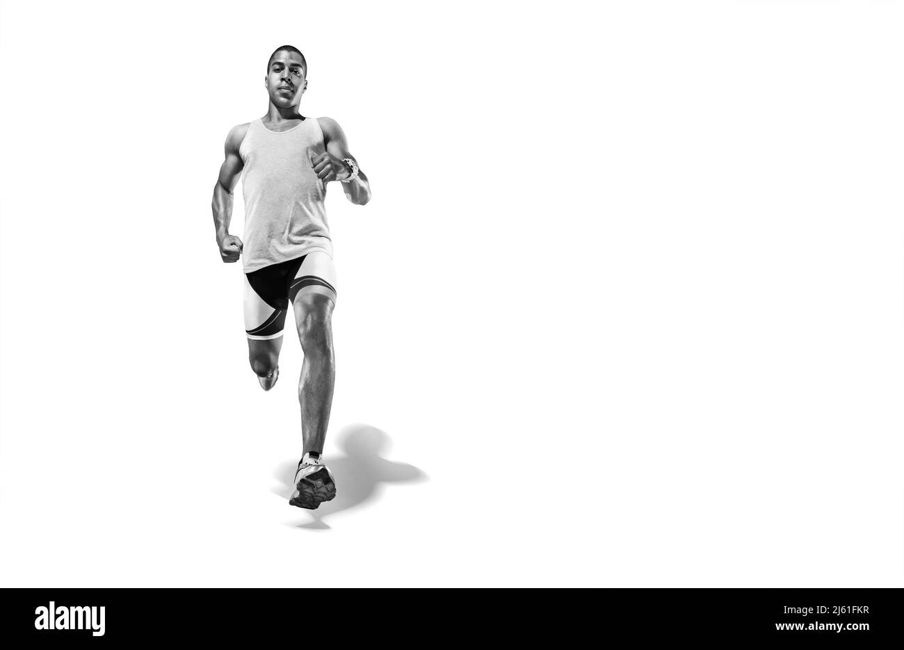 Sports background. Runner on the start. Black and white image isolated on white. Stock Photo