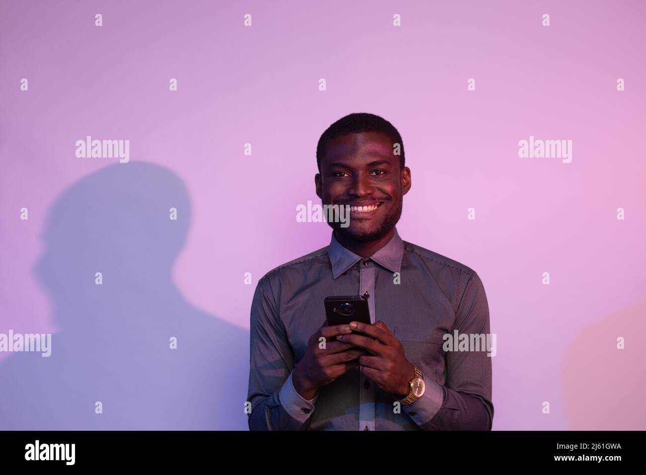 Excited black man checking hi-res stock photography and images - Alamy
