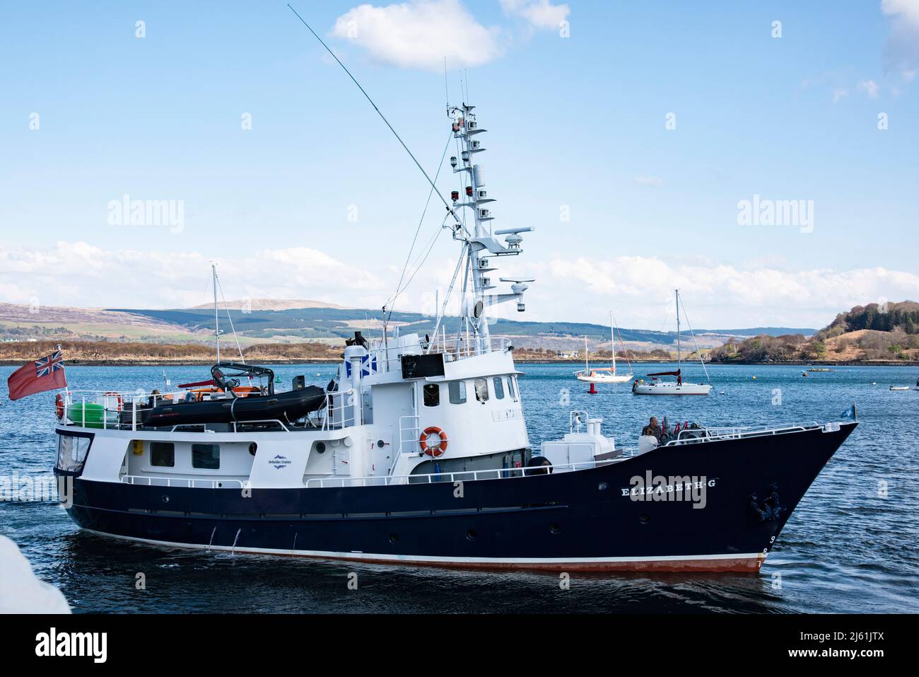 Hebrides Cruises Boat Elizabeth G in Tobermory Harbour on the Island of Mull in the Inner Hebrides off the West Coast of Scotland Stock Photo