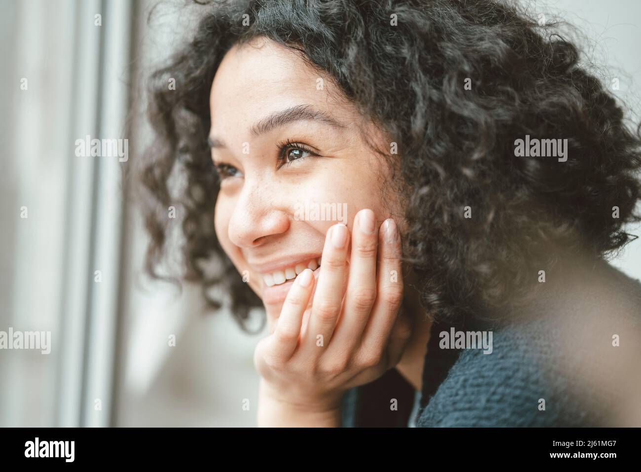 Black curly hair hi-res stock photography and images - Alamy