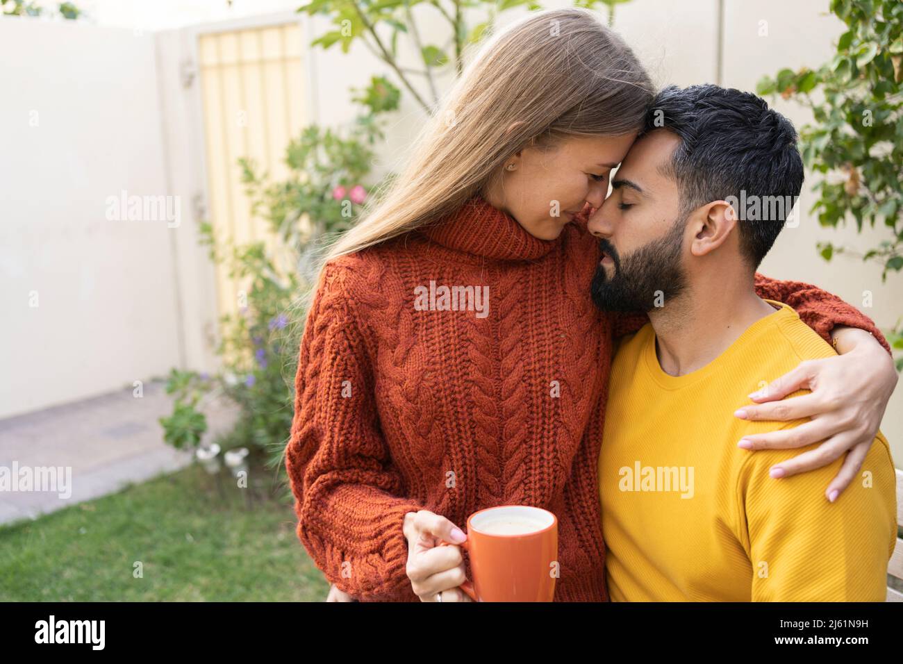 Man arm around woman group hi-res stock photography and images - Alamy
